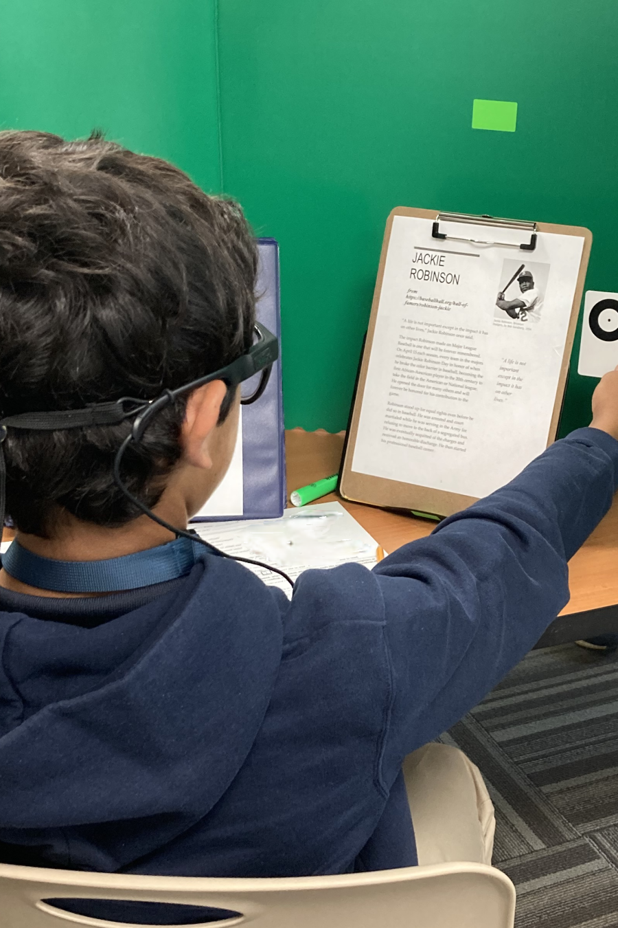 A student calibrates their Tobii Glasses